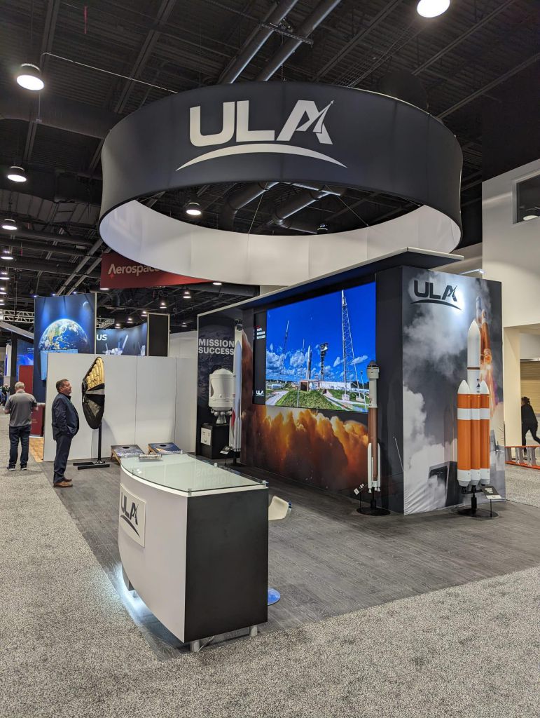 ULMA exhibition booth with large LED video walls